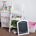 white freestanding blackboard with 3 flower display shelves